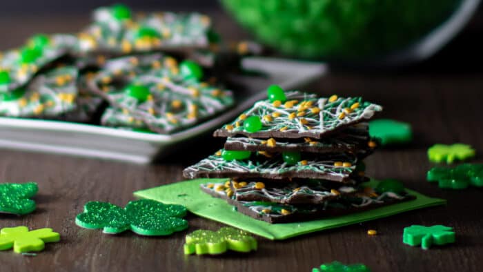 A stack of chocolates with a holiday theme.