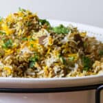 Fragrant rice served with layers of curried meat.