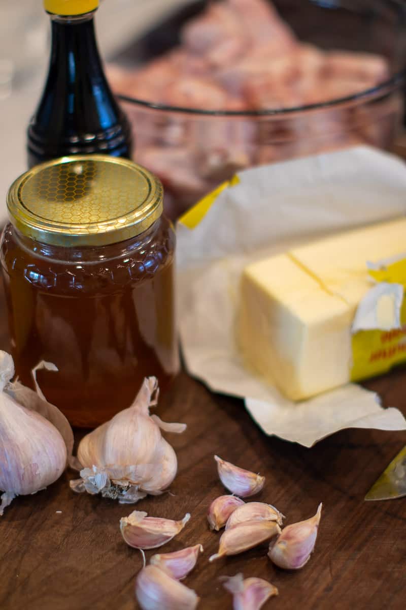 An image of butter, garlic, honey and soy sauce.