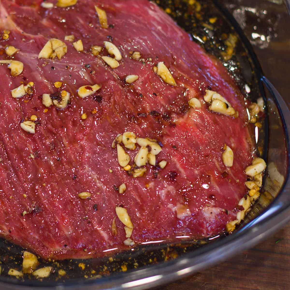 Flank steak in a marinade.