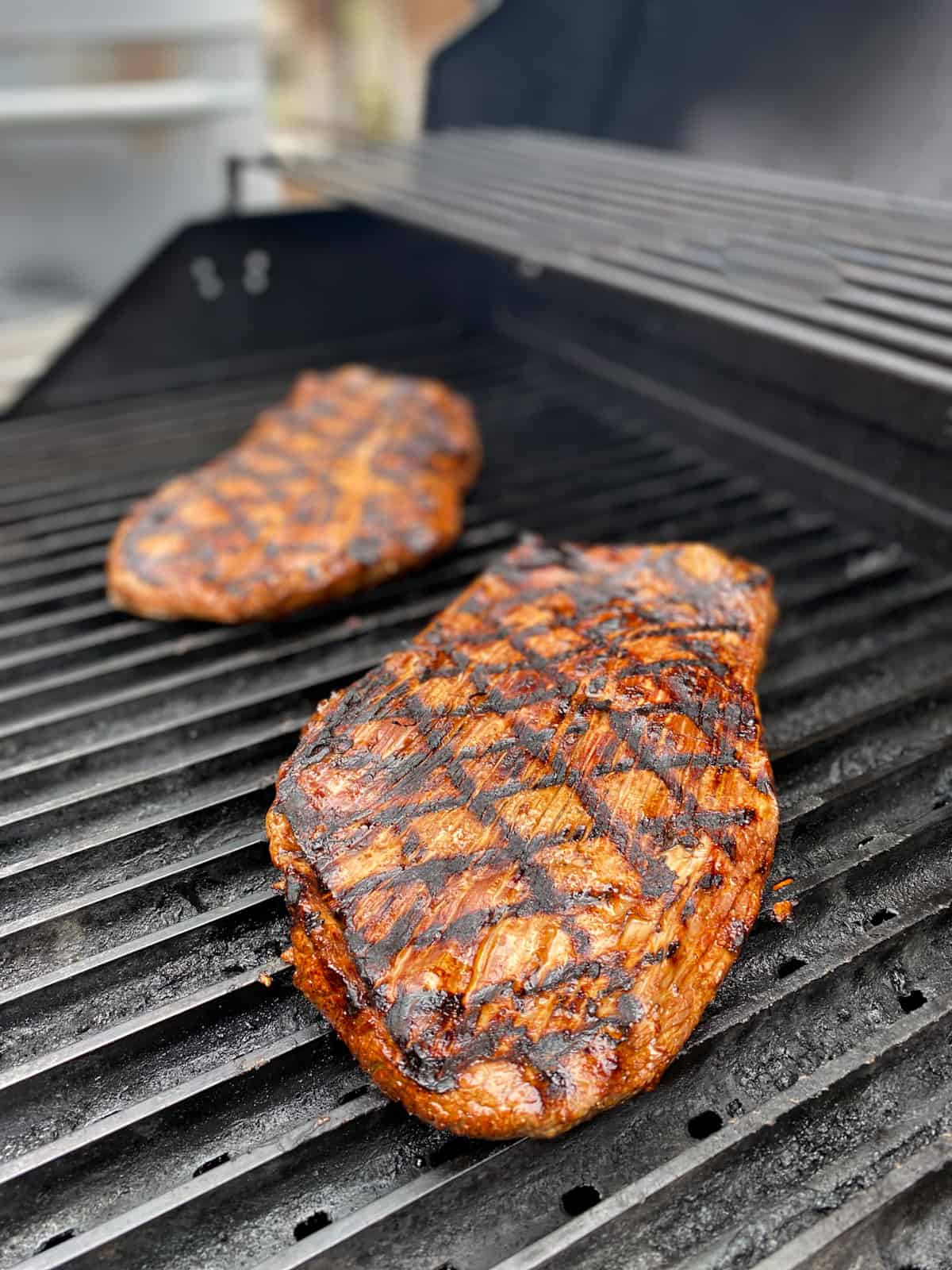 Flank steaks with grilled char lines.