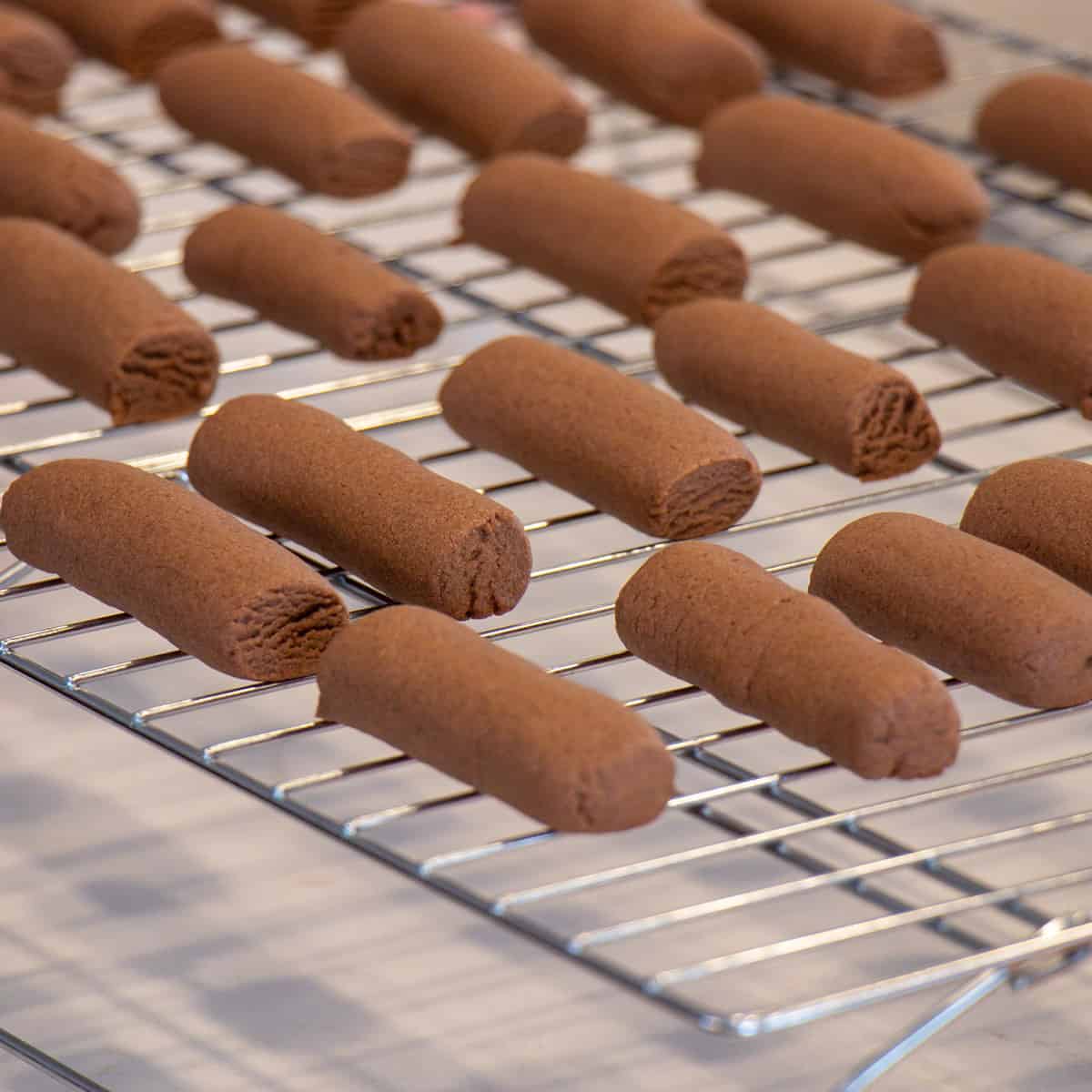 Fresh baked cookies cooling on a rack.