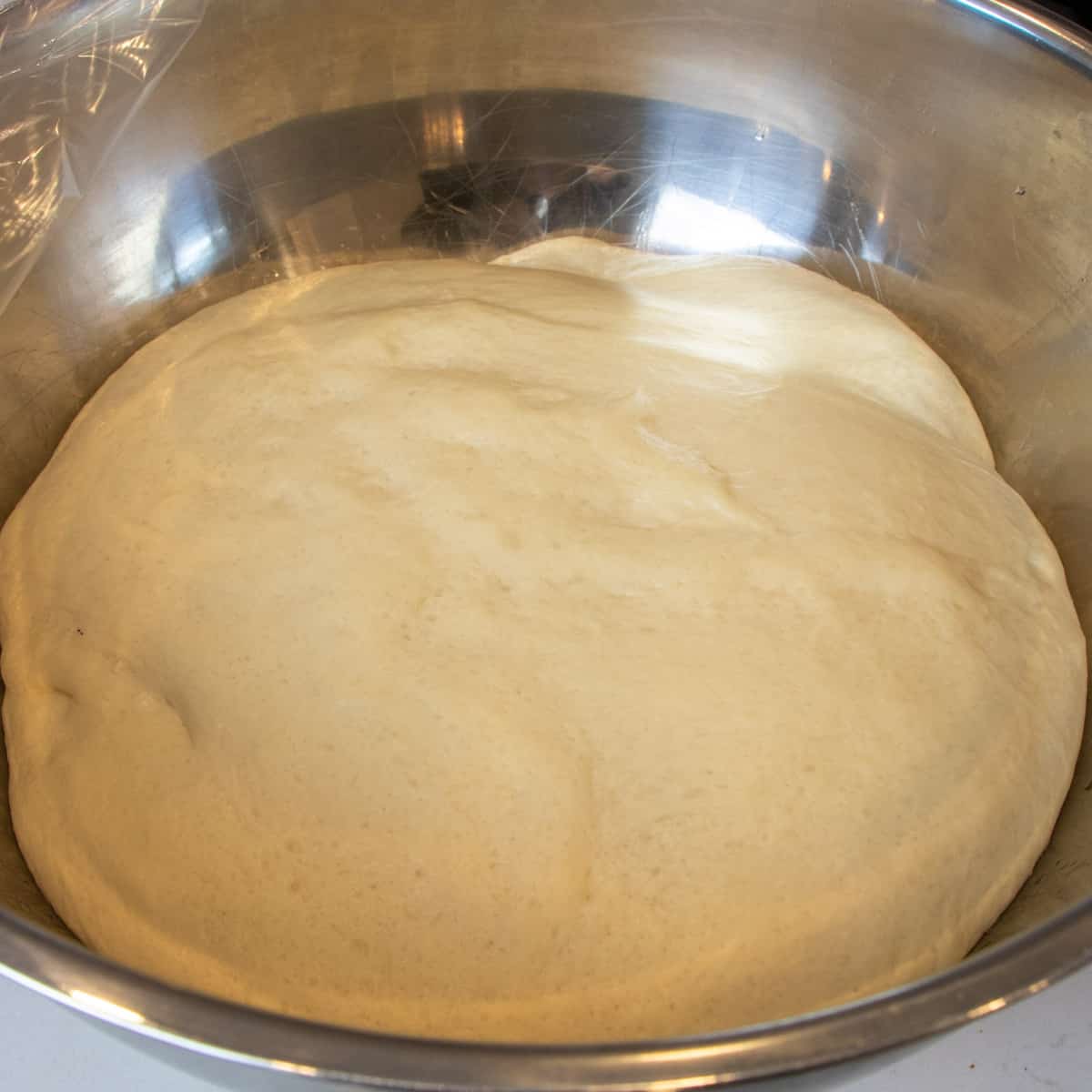 Dough that has finished rising and is ready to be rolled.
