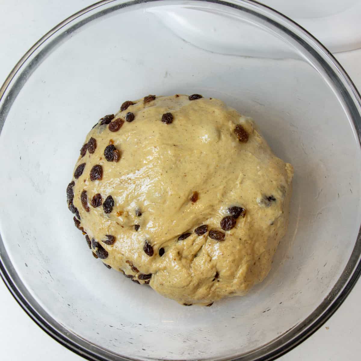 Dough in a glass bowl before proofing.