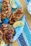 Overhead picture of a plate of grilled chicken.