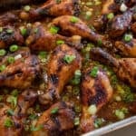 Baked chicken drumsticks in a baking pan