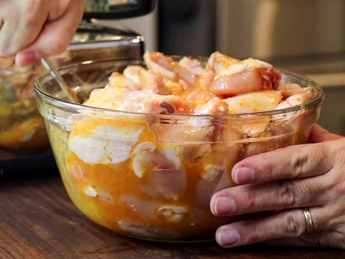 Mixing up all the ingredients in a bowl.