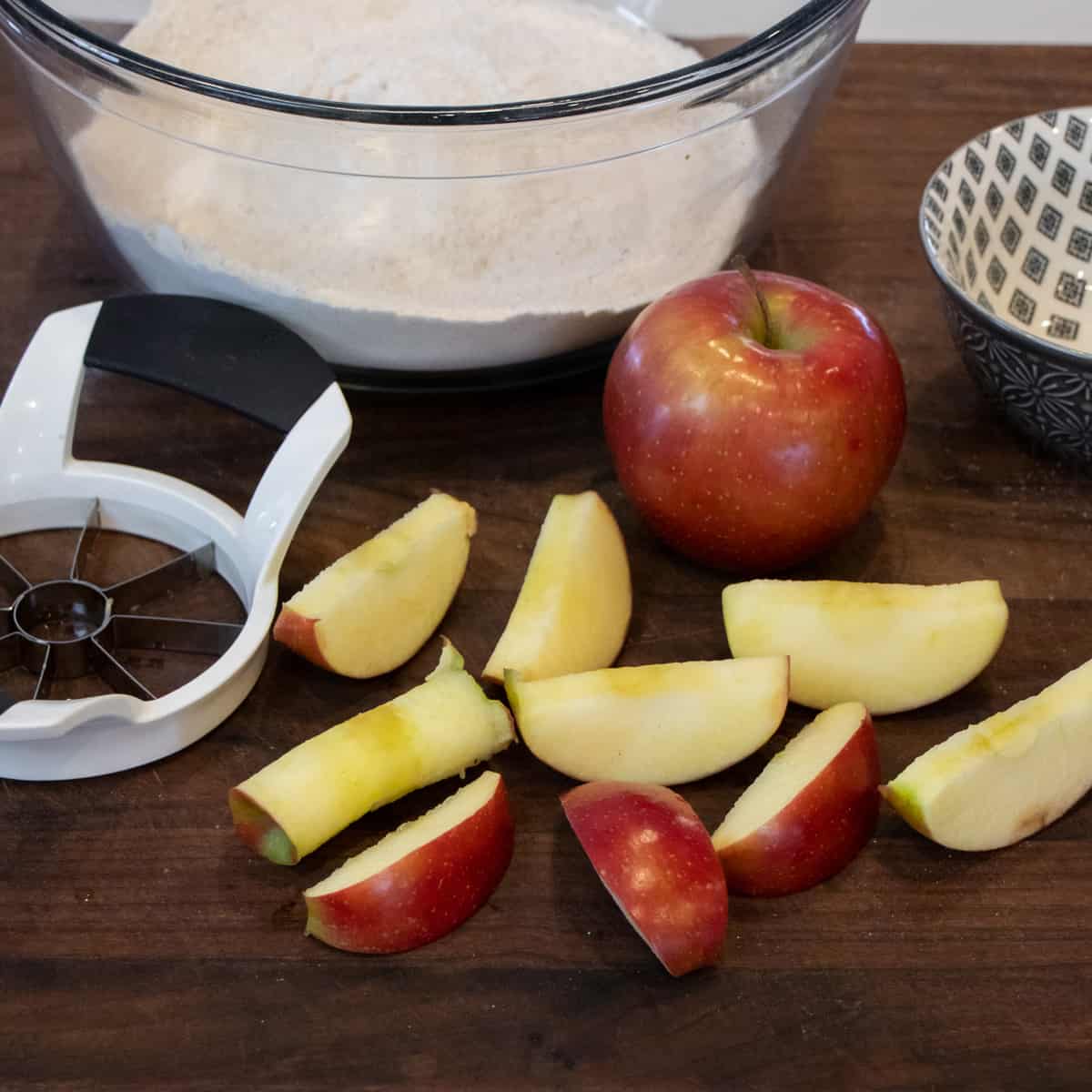 An apple cored and cut into wedges.