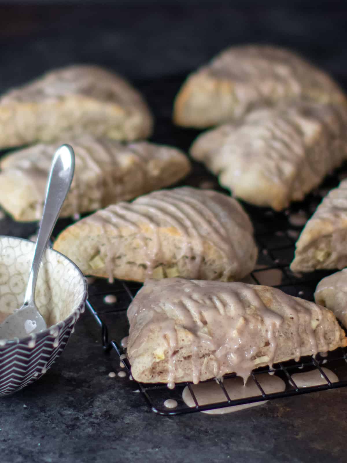 Fresh baked scones on a cooling rack.