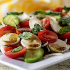 Caprese salad served on a large platter.