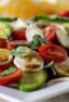 Caprese salad served on a large platter.