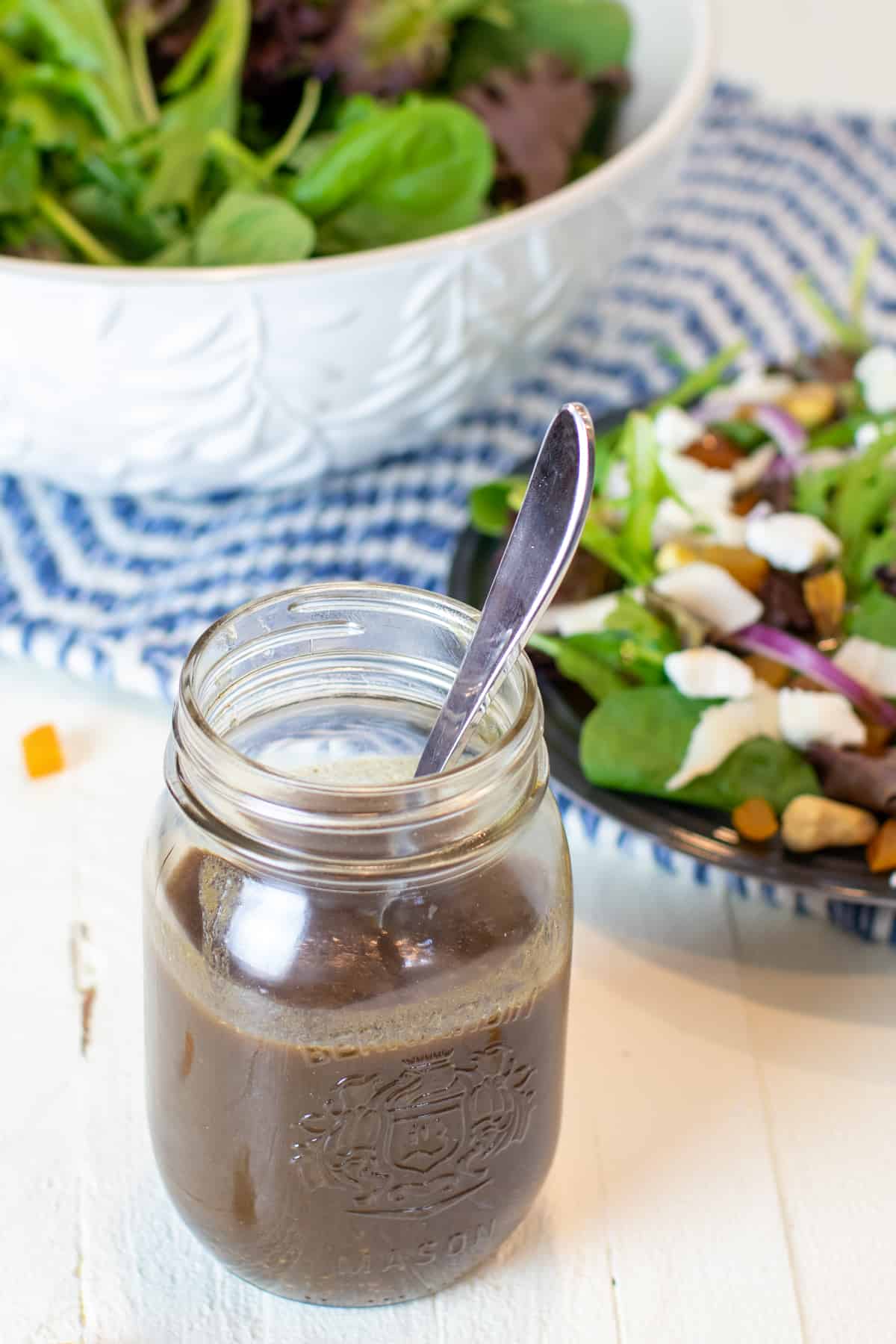 Overhead picture of salad and homemade dressing.