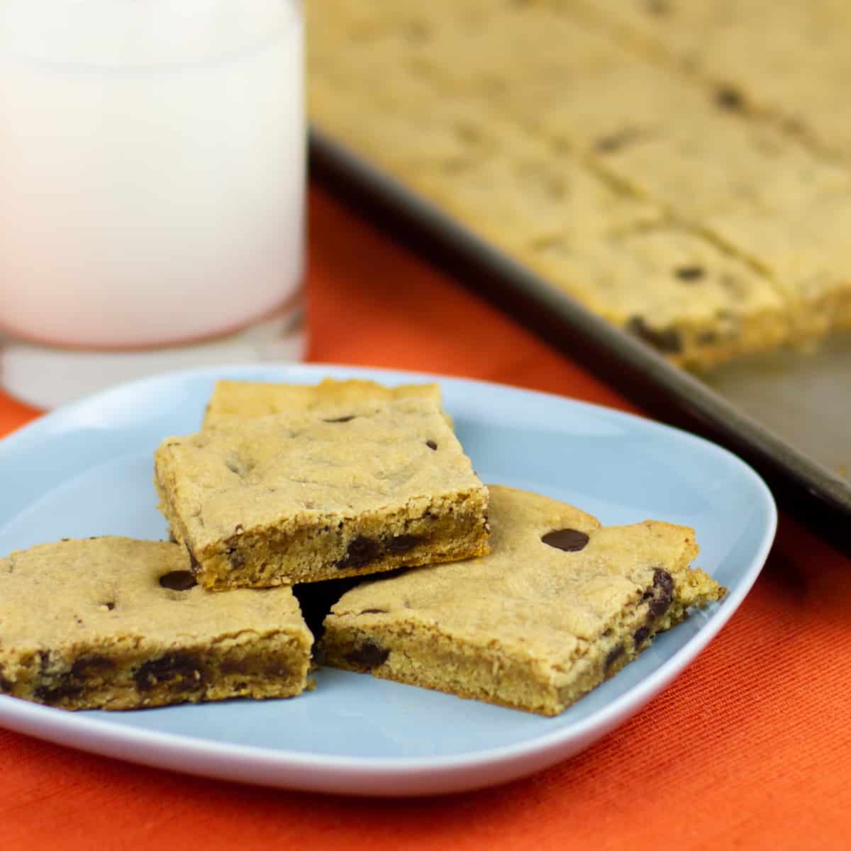 A close up picture of cookie bars on a plate.