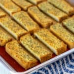 Baked garlic bread that has just been removed from the oven.