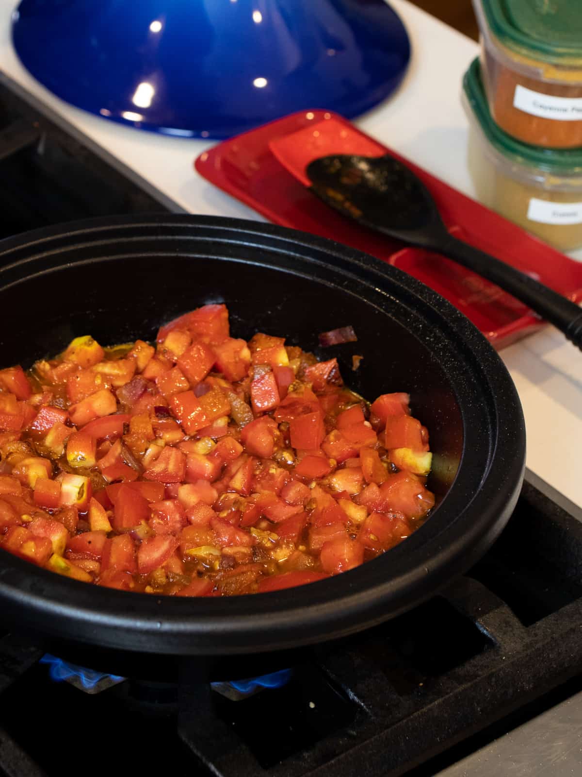 Diced tomatoes, onions and peppers sautéing.