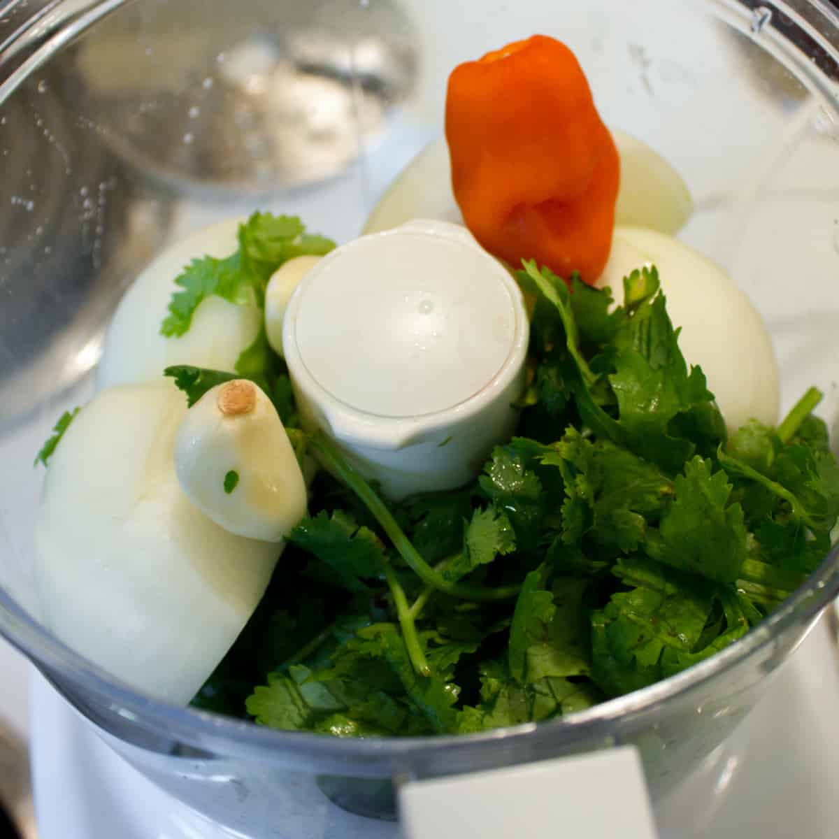 Ingredients for the curry paste in a food processor.