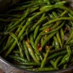 Close up picture of sautéed green beans.