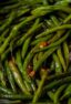 Sautéed green beans in a fry pan.