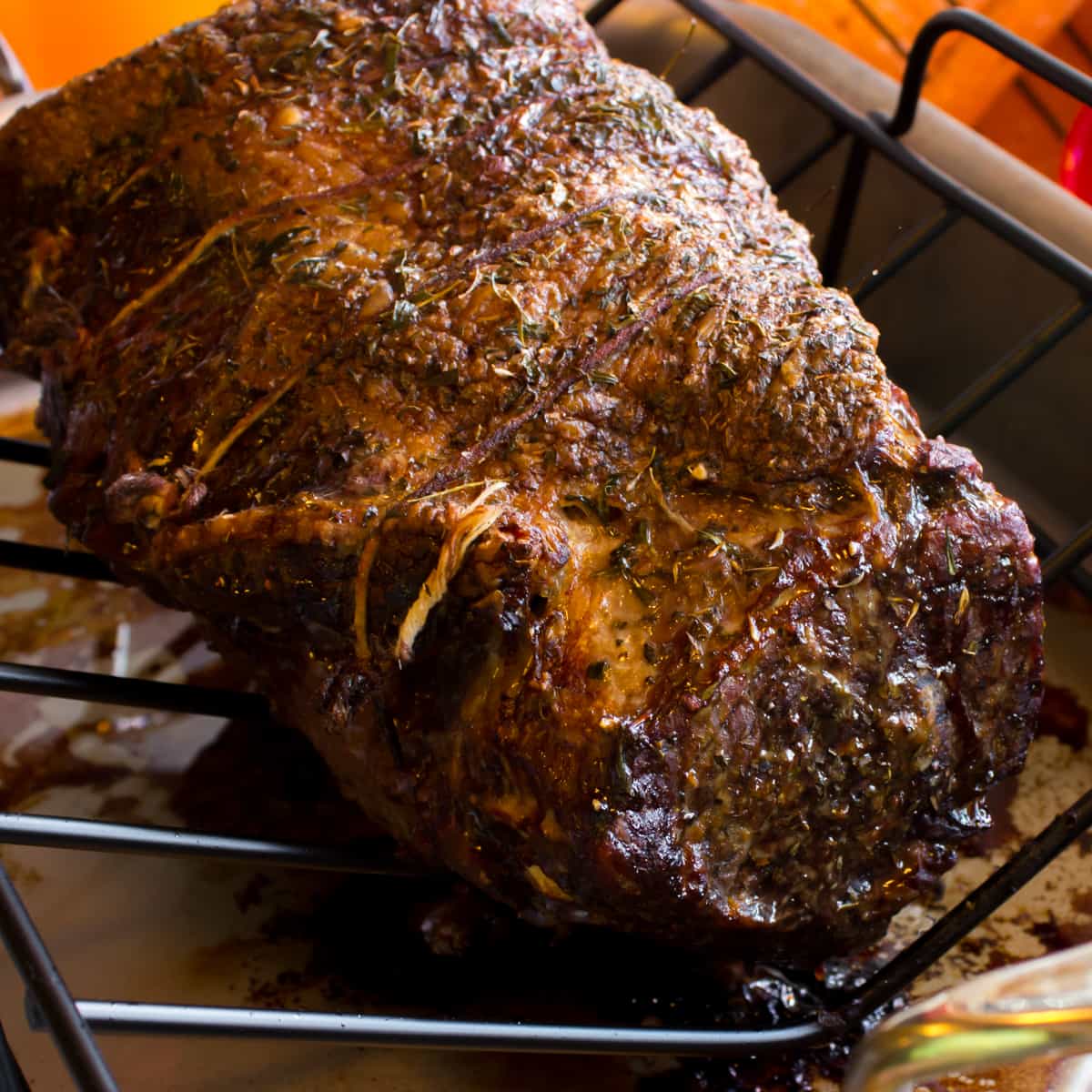 Cooked roast on a roaster rack.