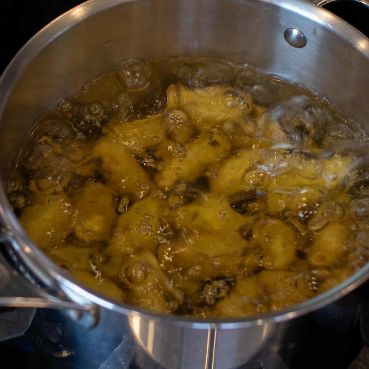 Potatoes in a pot with boiling water.