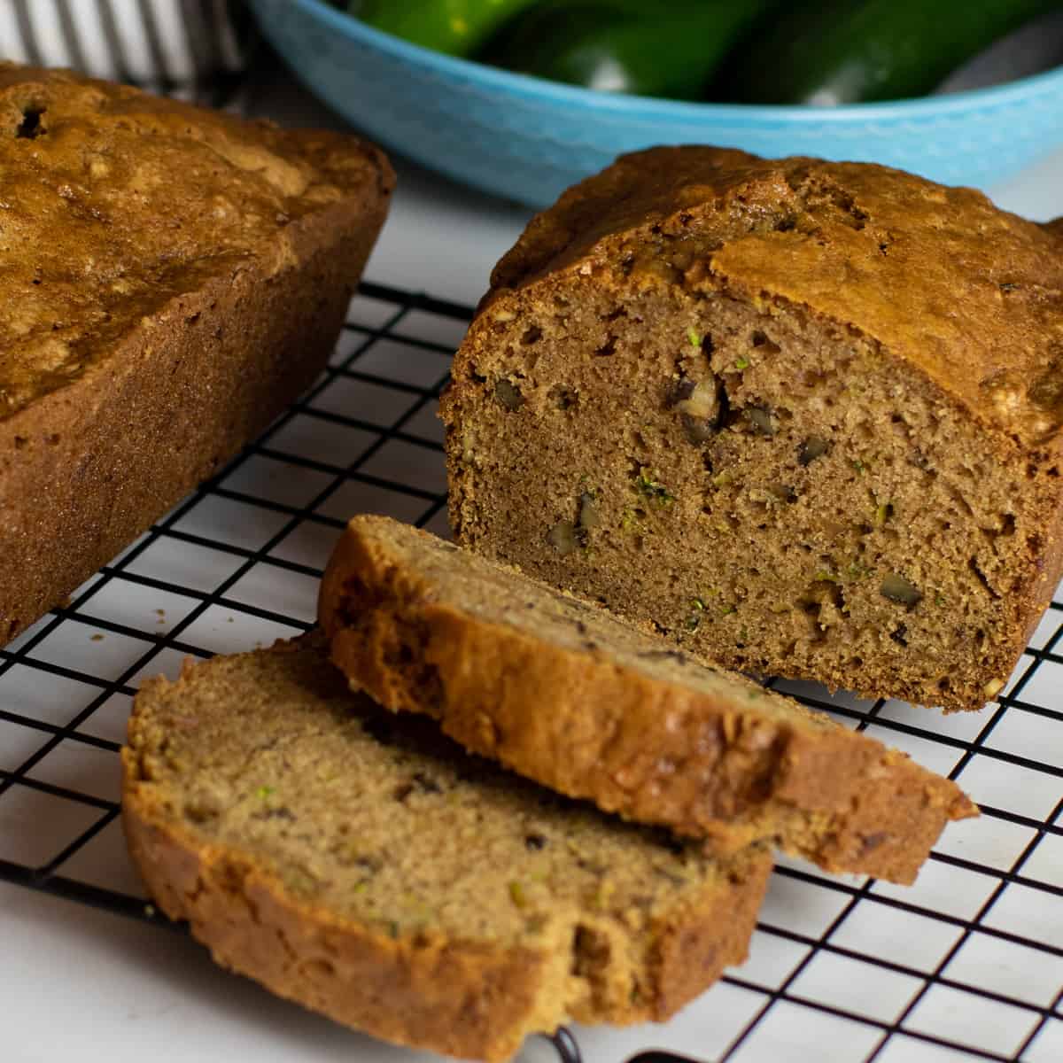 A close up picture of sliced zucchini loaf.