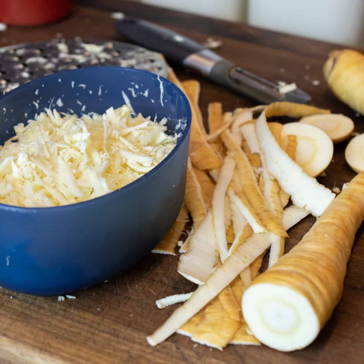Grated parsnips in an oval container.