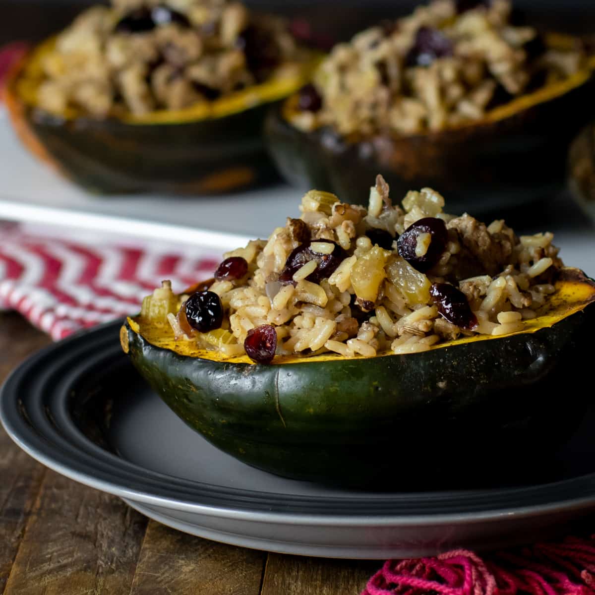 A close up picture of a stuffed acorn squash