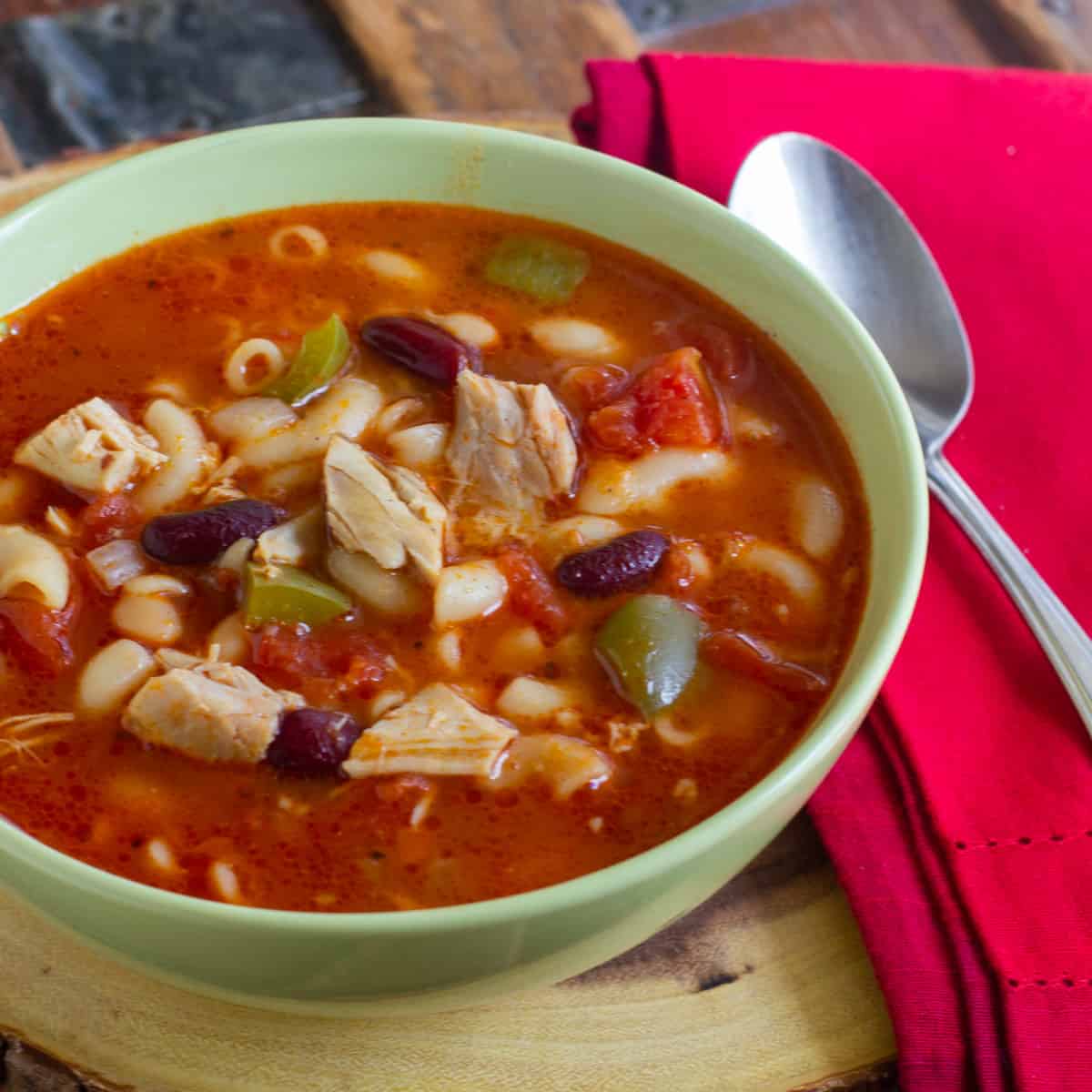 Close up picture of minestrone in a bowl.