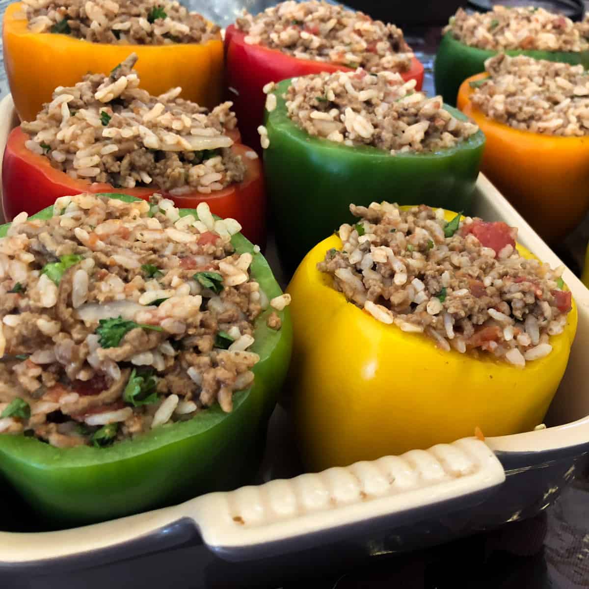 Raw peppers filled with cooked stuffing.
