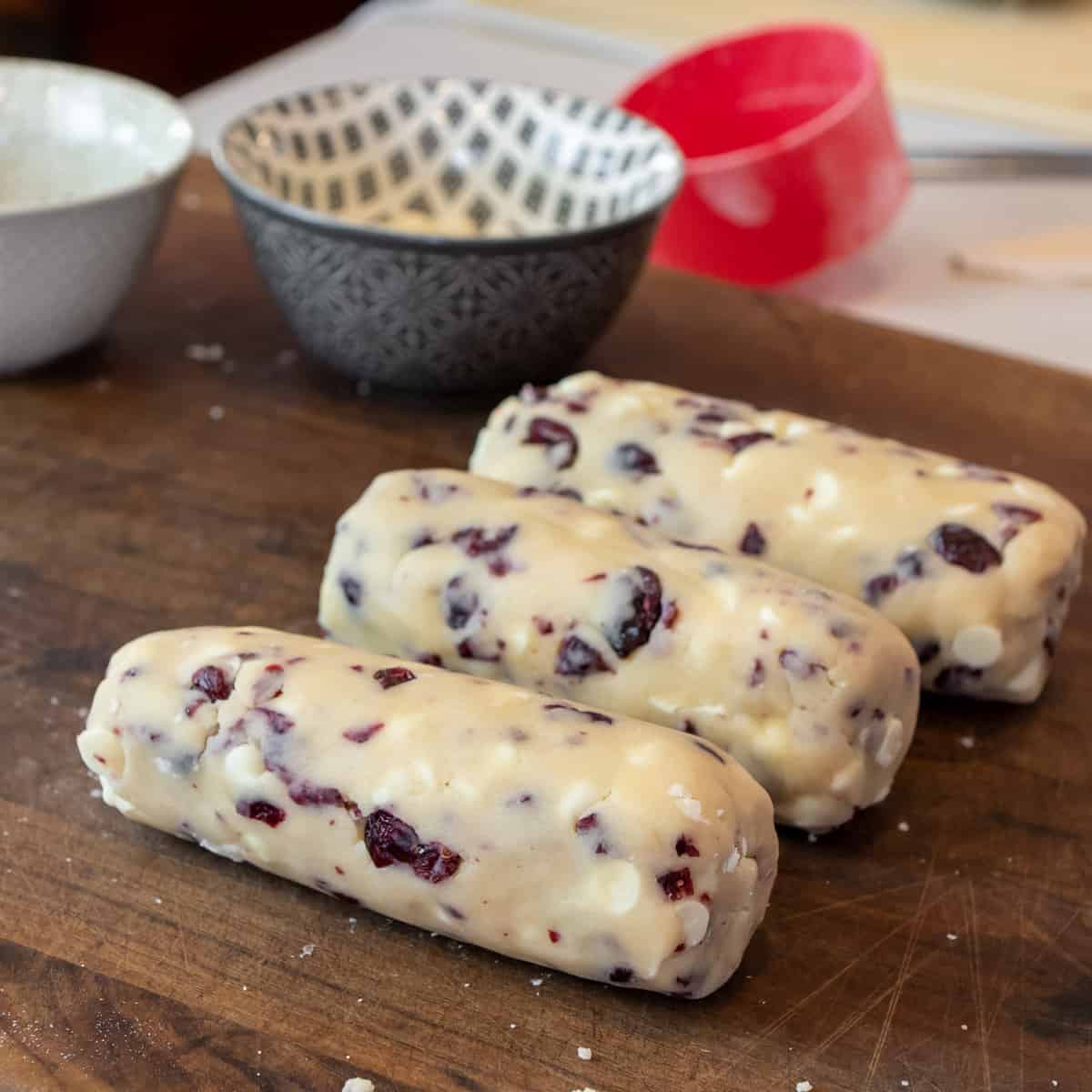 Cookie dough rolled into three logs.