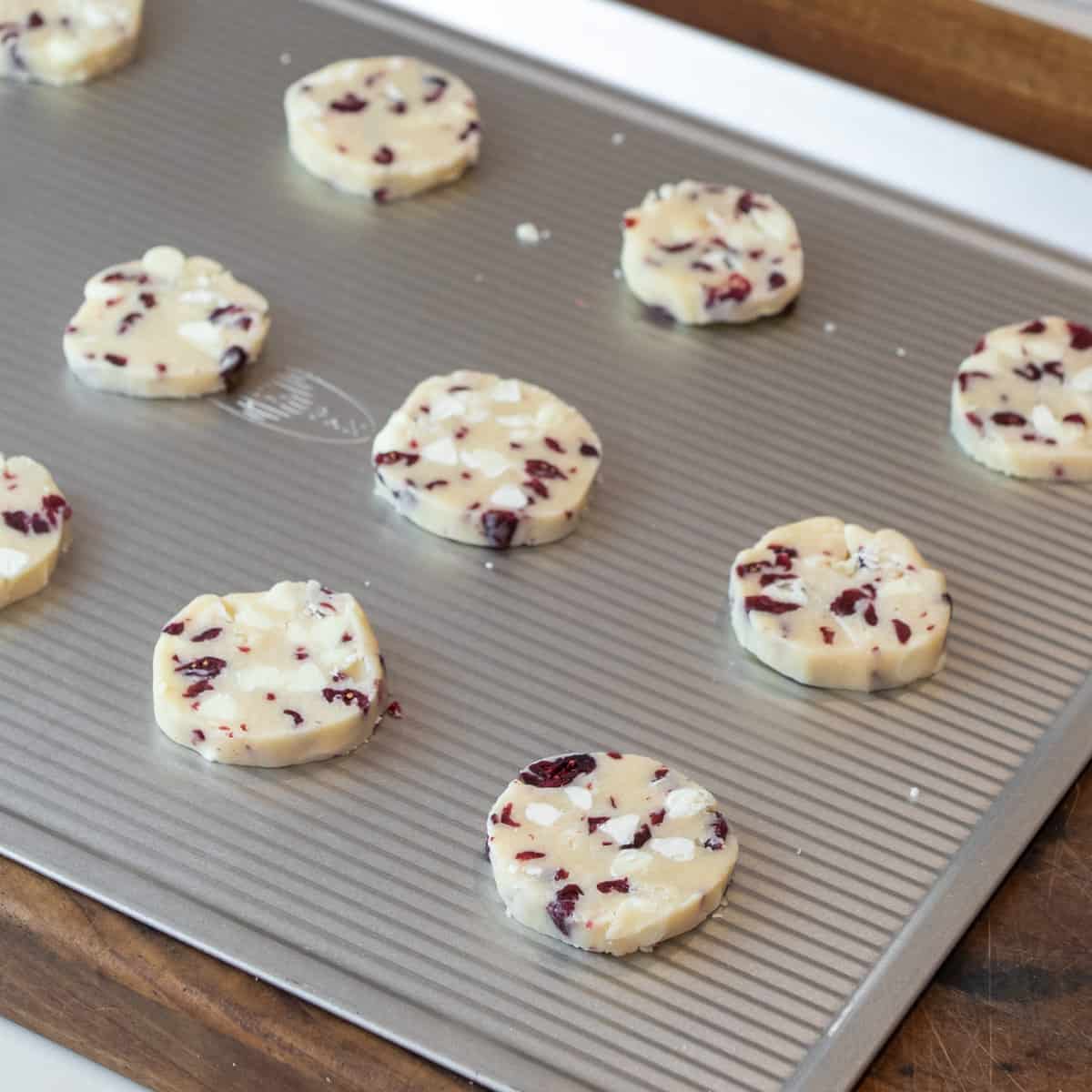 Unbaked cookies placed on a baking sheet.