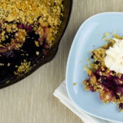 A plate with dessert crumble serving.