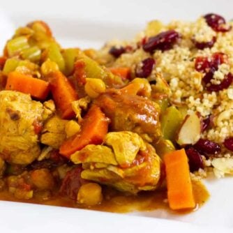 A plate of stewed chicken and couscous