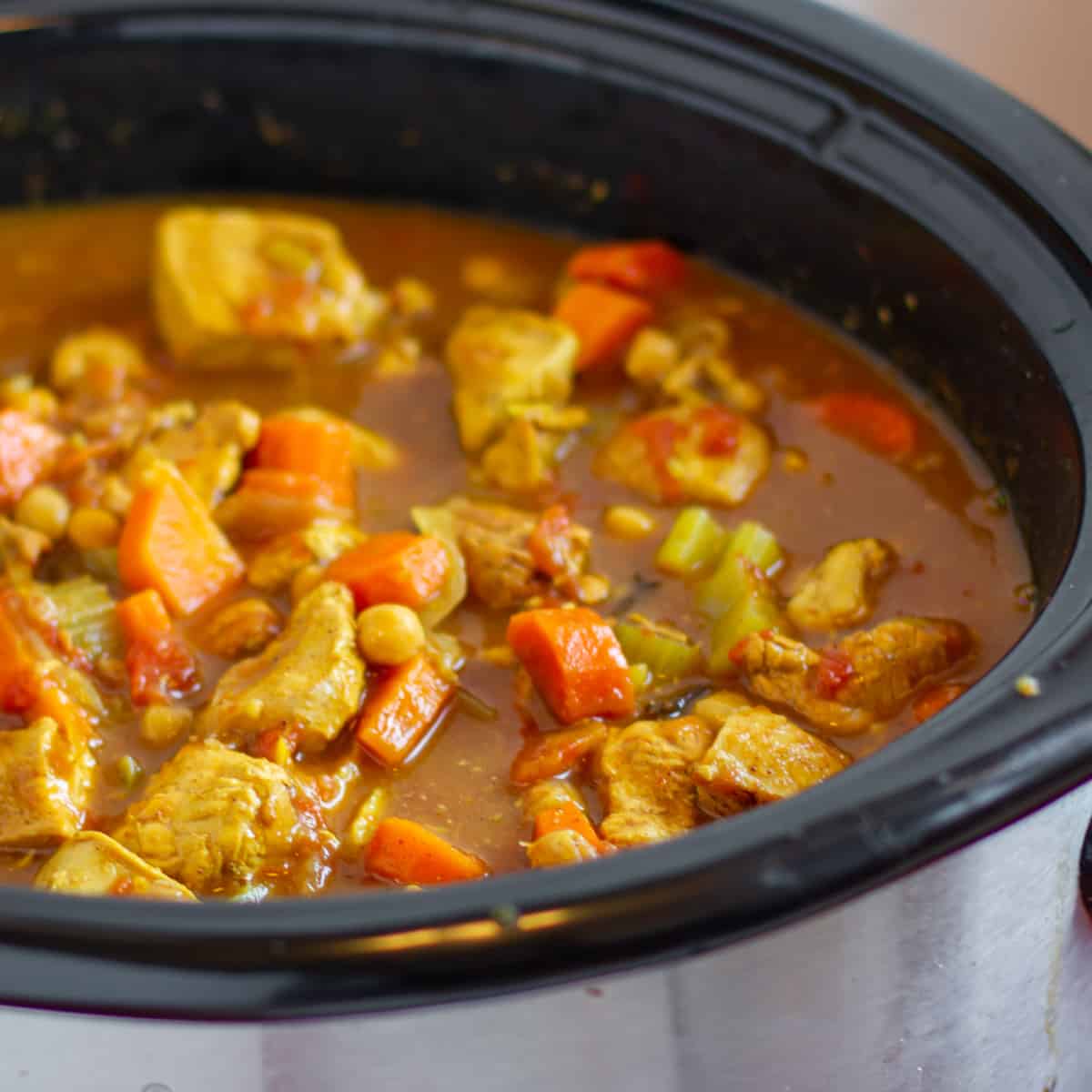Tagine in a slow cooker that has finished cooking and ready to serve.