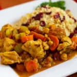 Chicken stew with vegetables on a plate.