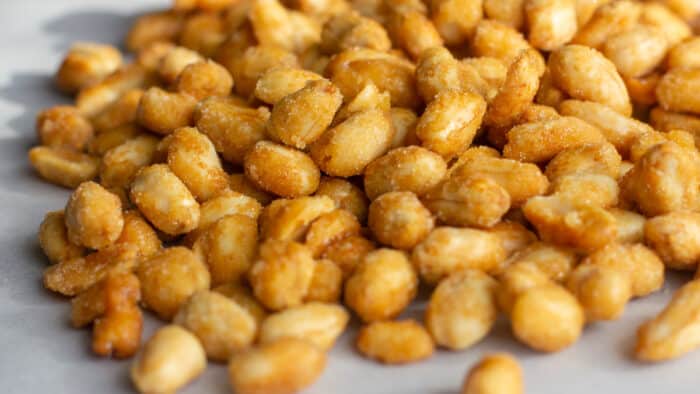 A pile of honey roasted peanuts