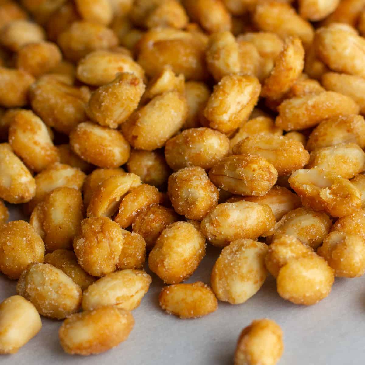 Close up picture of honey roasted peanuts.