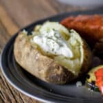 Baked Potato on a dinner plate.