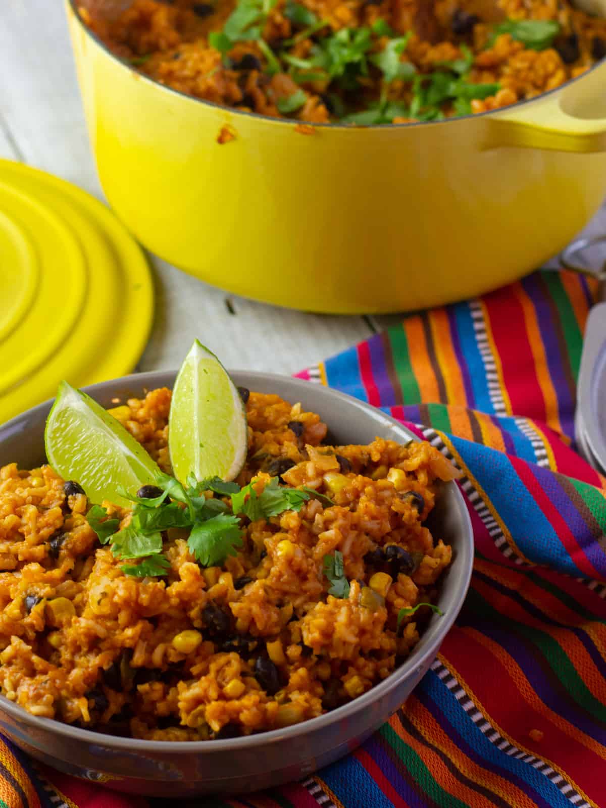 A grey bowl with cooked Mexican rice.