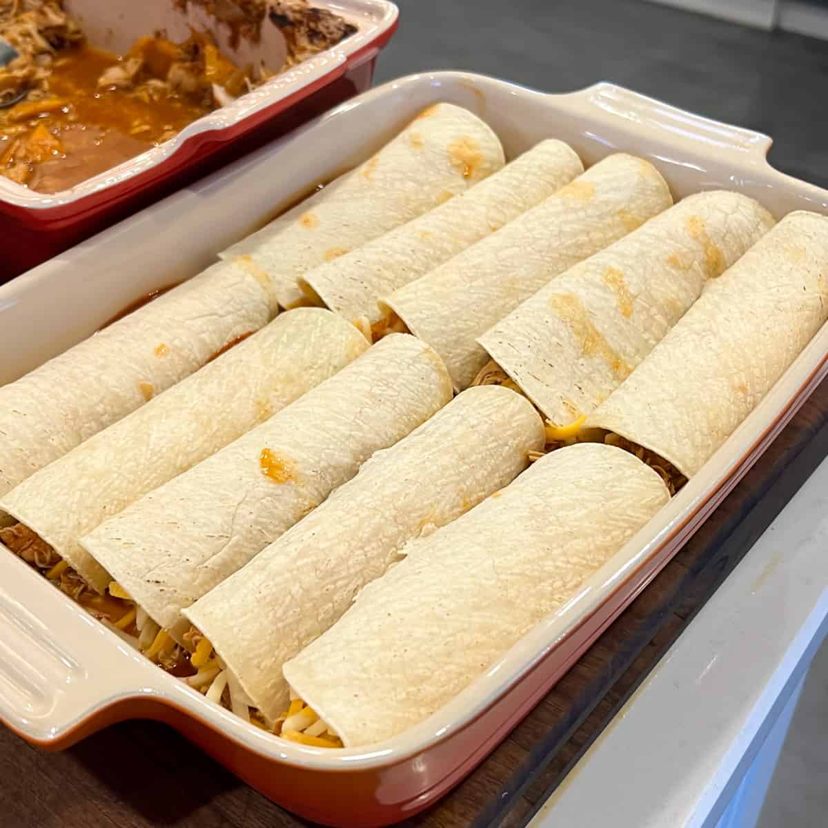 Rolled enchiladas ready to go in the oven.