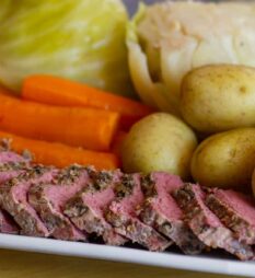 Boiled dinner on a white platter.