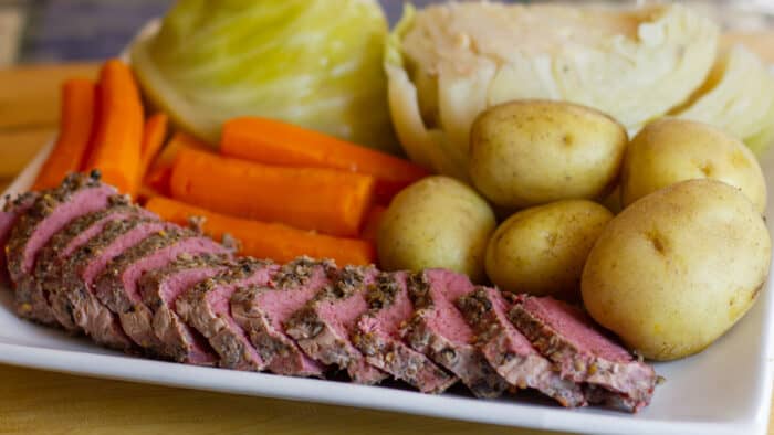 Boiled dinner on a white platter.