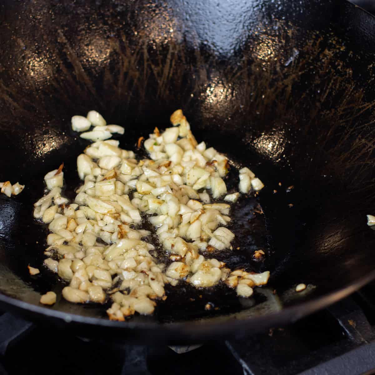 Minced garlic in hot oil.