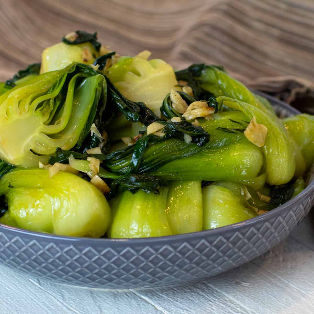 Sautéed bok choy in a serving bowl.