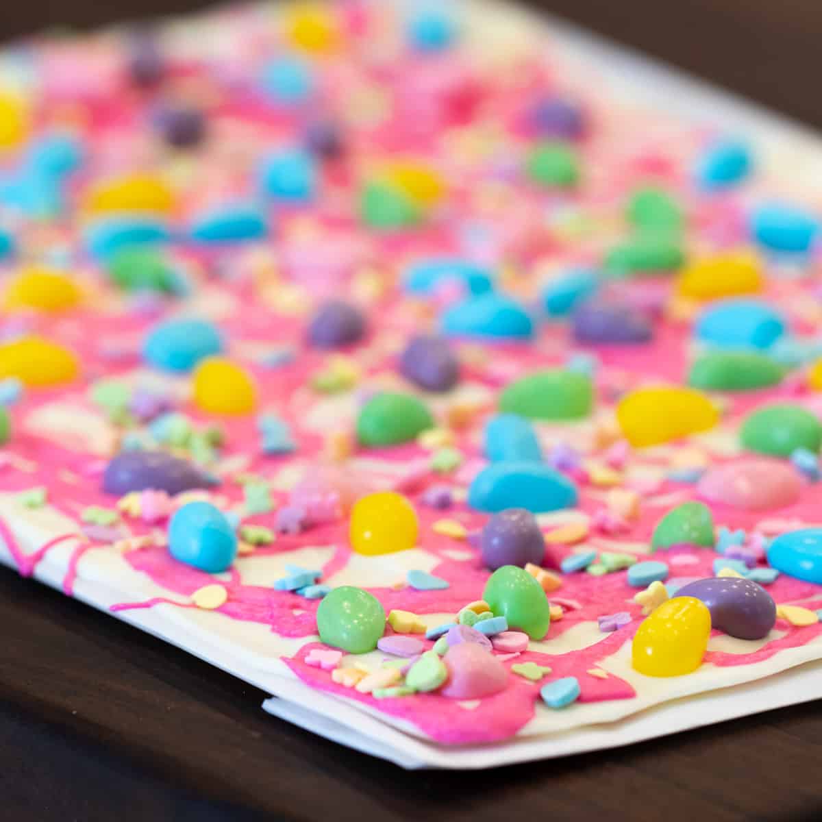 Chocolate bark with bright coloured jelly beans.