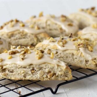 Eight scones on a cooling rack.