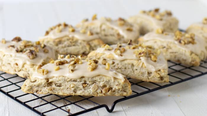 Eight scones on a cooling rack.