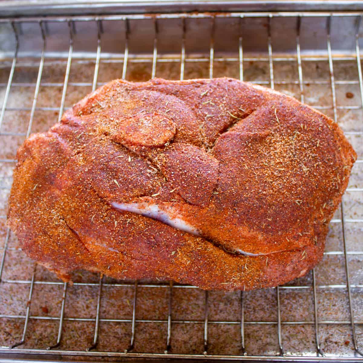 Pork roast with bbq seasoning rubbed all over.