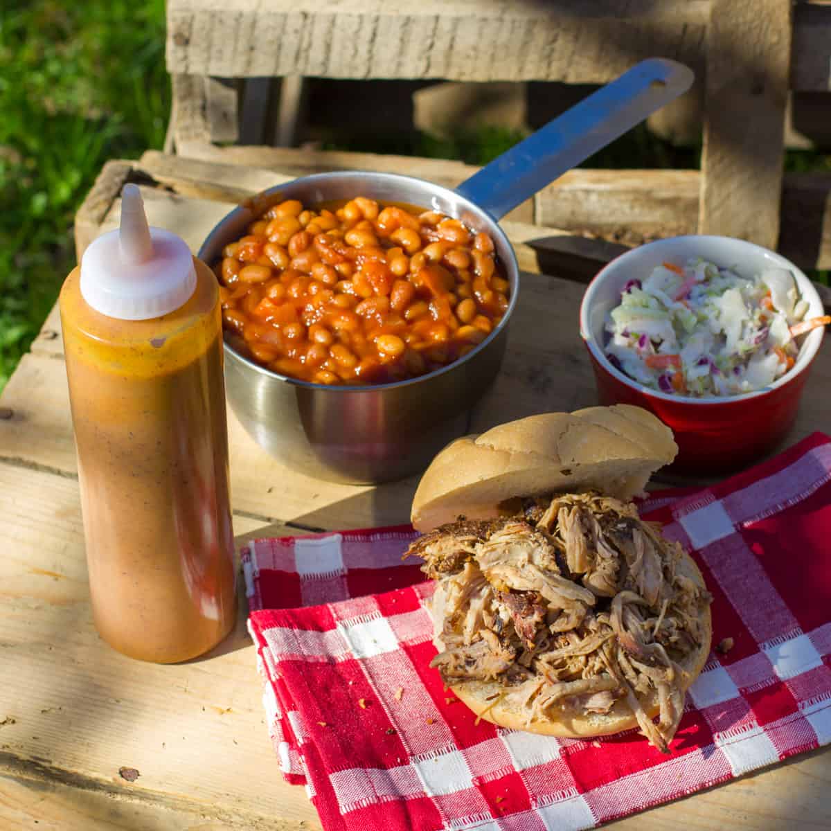 Pulled pork, baked beans and mustard sauce.