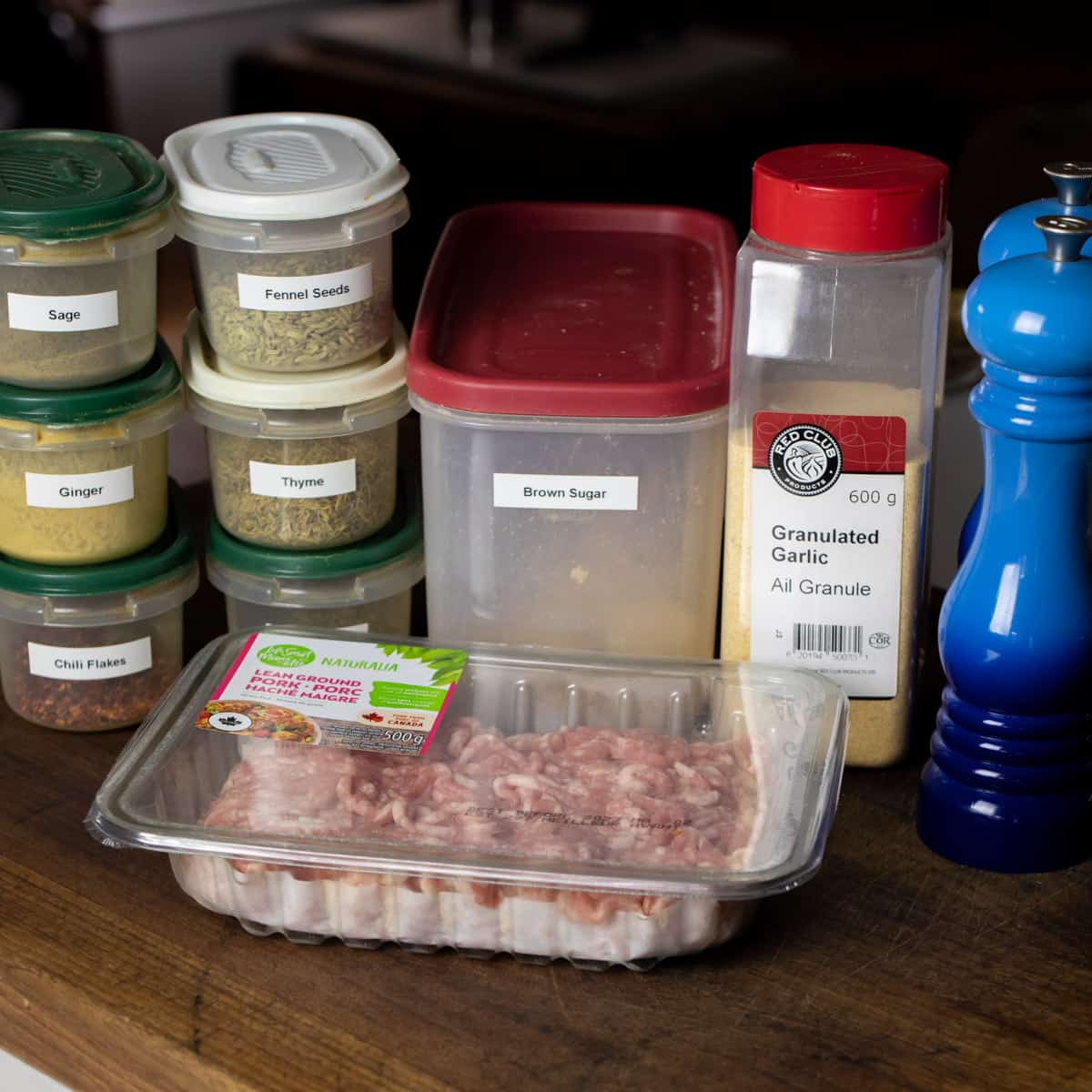 Ingredients placed on a wooden cutting board.